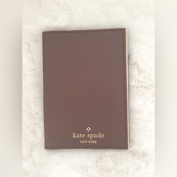 kate spade Handbags - NWOT Kate Spade Passport Holder wallet